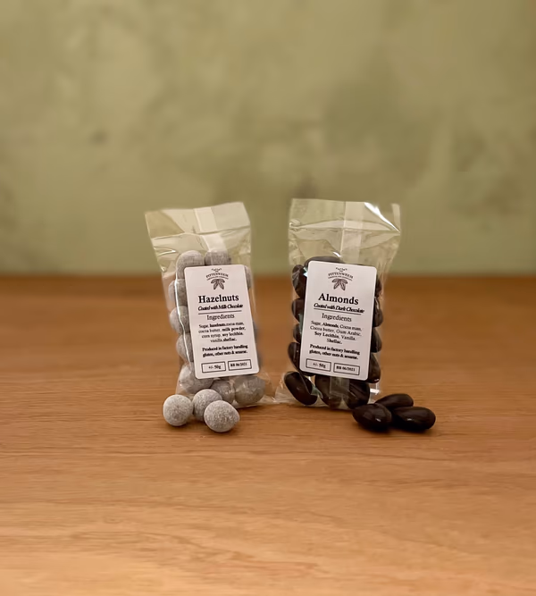 Milk chocolate covered Hazelnuts or Dark chocolate covered Almonds